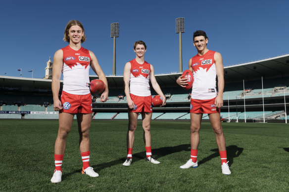 Locked away: James Rowbottom, Harry Reynolds and Justin McInerney have signed contract extensions with the Sydney Swans.