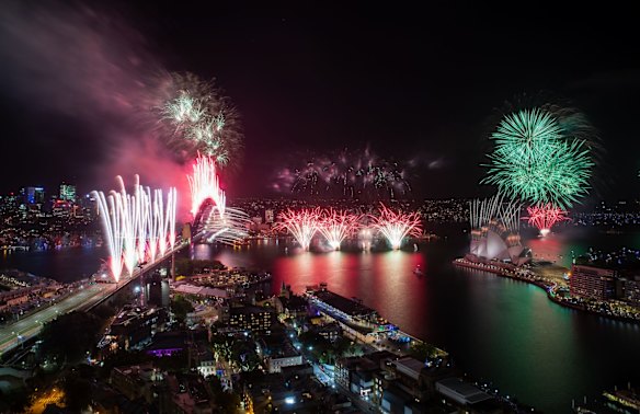 At midnight, a colourful display with bursts of neon, pastel and spinning fireworks blast into the sky to a soundtrack created by electronic music duo The Presets.