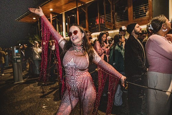 Emily Head, who travelled from Sydney to attend the festival, waiting in line at The Beach Hotel.