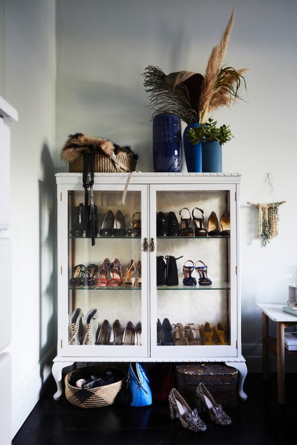 An heirloom china cabinet, handed down from Amber’s grandmother, and her great aunt before that, now houses an enviable collection of high heels.
