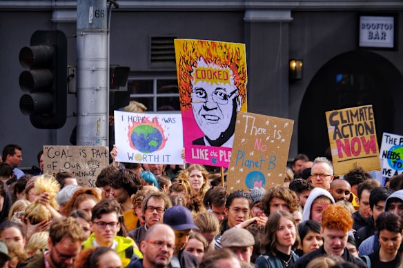 Protesters take part in the Climate Emergency XR Snap Rally in Melbourne.