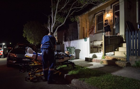 11:01pm. NSW Ambulance Paramedic Gareth Garne works on a 70 year old male outside his Leichhardt home. He experienced loss of conciousness and low blood pressure. He was stabilised and transported to RPA Hospital.