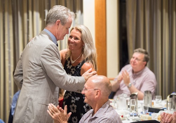 Ross Cameron embraces Kirralie Smith after speaking.