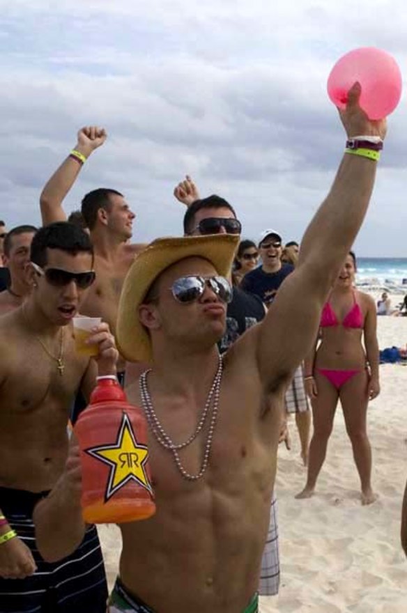 Spring break parties on despite violence