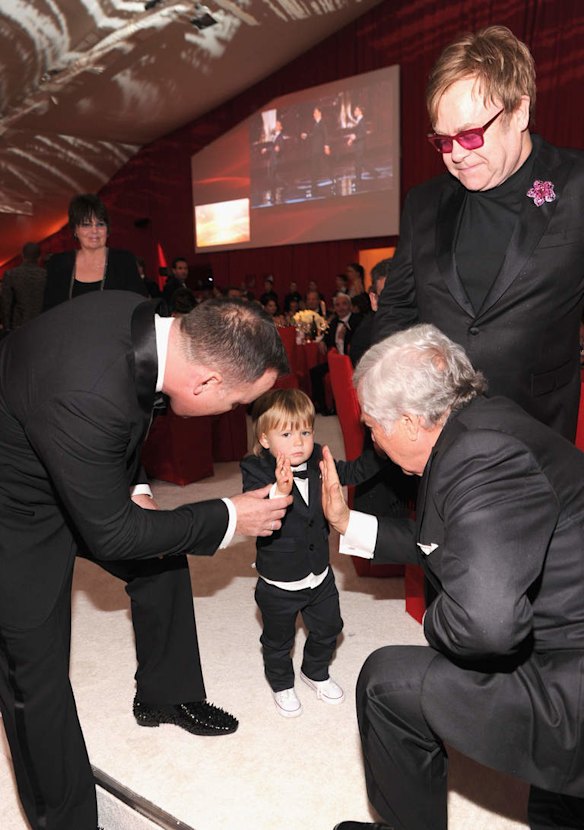 David Furnish, Zachary Furnish-John and Sir Elton John attend the 21st Annual Elton John AIDS Foundation Academy Awards Viewing Party.
