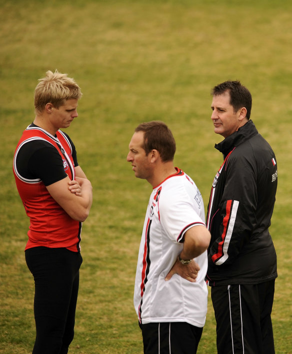 Flashback: Nick Riewoldt talks with Dave Misson and Ross Lyon before St Kilda training in 2008.