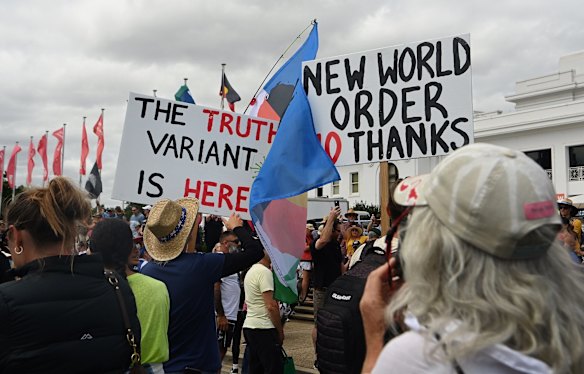 Some of the placards on display at the Convoy to Canberra rally in Canberra on Saturday.