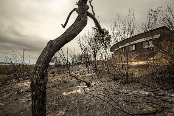 Constructed largely of concrete and steel, this hilltop house fared pretty well despite being surrounded by large flames in Thursday afternoon's Bawley Point bushfire.