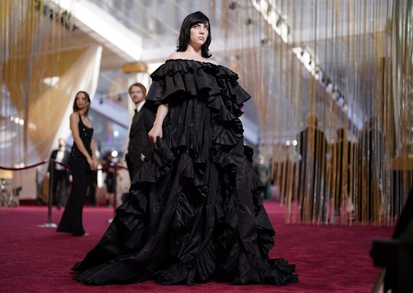 Billie Eilish in a ruffled Gucci gown. 