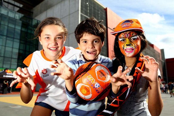 Brisbane Roar fans Lana Joseph, 11, Kyah Joseph, 8 and Ava Joseph, 9, at the Grand Final Saturday at Suncorp Stadium ahead of the A-League 2014 Grand Final.