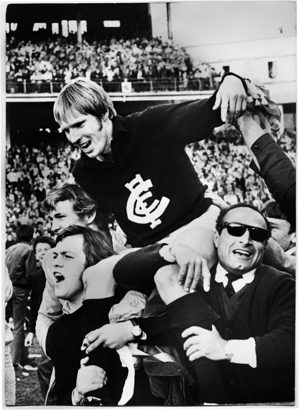 Ted Hopkins.
"Hopkins is most famous for his performance in Carlton's victory over Collingwood in the 1970 VFL Grand Final." 
Photo is of Hopkins being chaired off following the 1970 grand final.
Photo is from Ted Hopkins.
CREDIT : Courtesy of Ted Hopkins