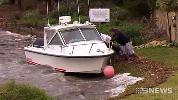 Several boats had broken away from their moorings in the heavy wind.