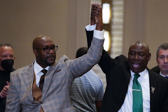 Philonise Floyd and Attorney Ben Crump, from left, react after a guilty verdict was announced at the trial of former Minneapolis police Officer Derek Chauvin for the 2020 death of George Floyd