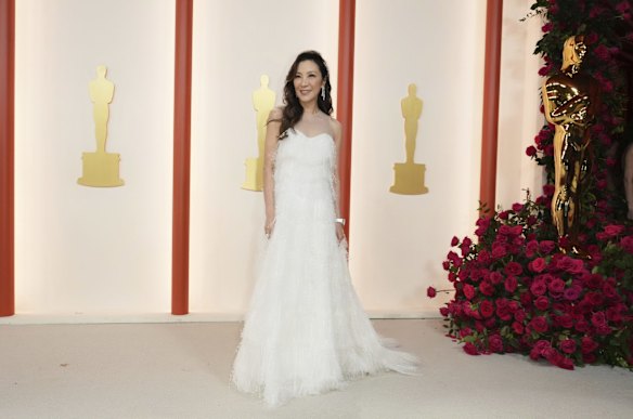 Michelle Yeoh wears Christian Dior couture.