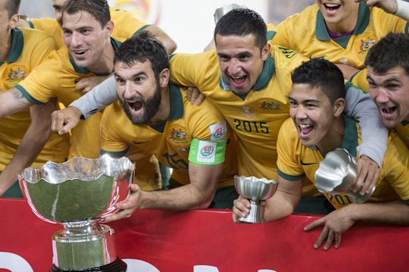 The Socceroos celebrate after winning the Asian Cup Final between Australian and Korean Republic at Stadium Australia, Sydney. 