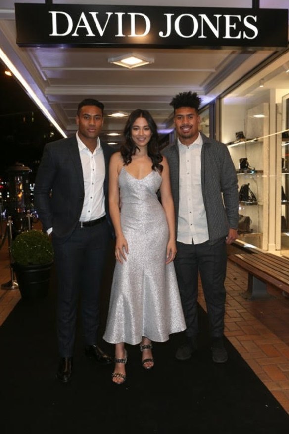 All Blacks Julian and Ardie Savea with Jessica Gomes (centre)