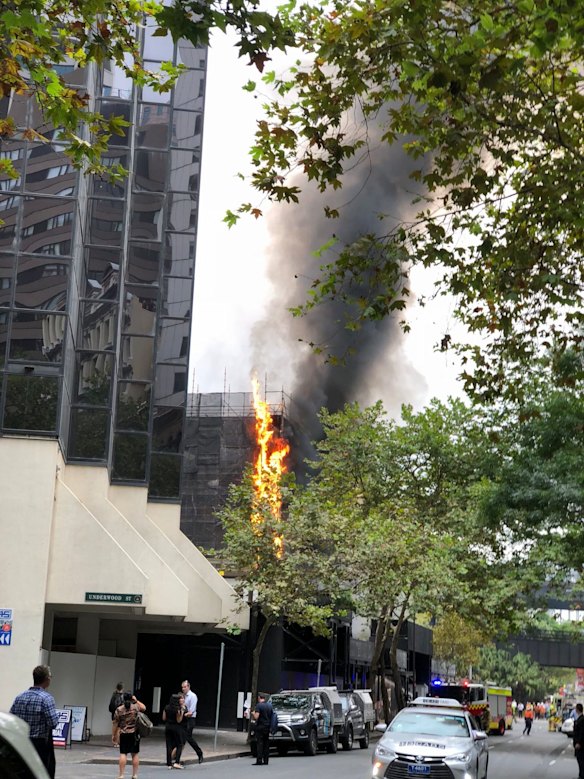 Crews batted the blaze as it rose up the building.