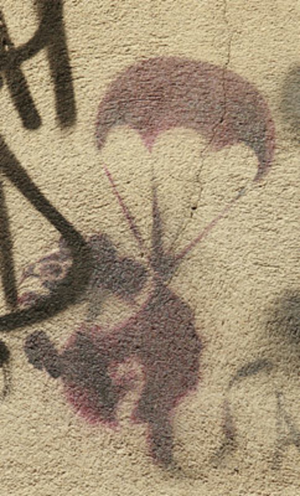 The original parachuting rat by street artist Banksy, which - until recently - could be found in one of Melbourne's lanes.