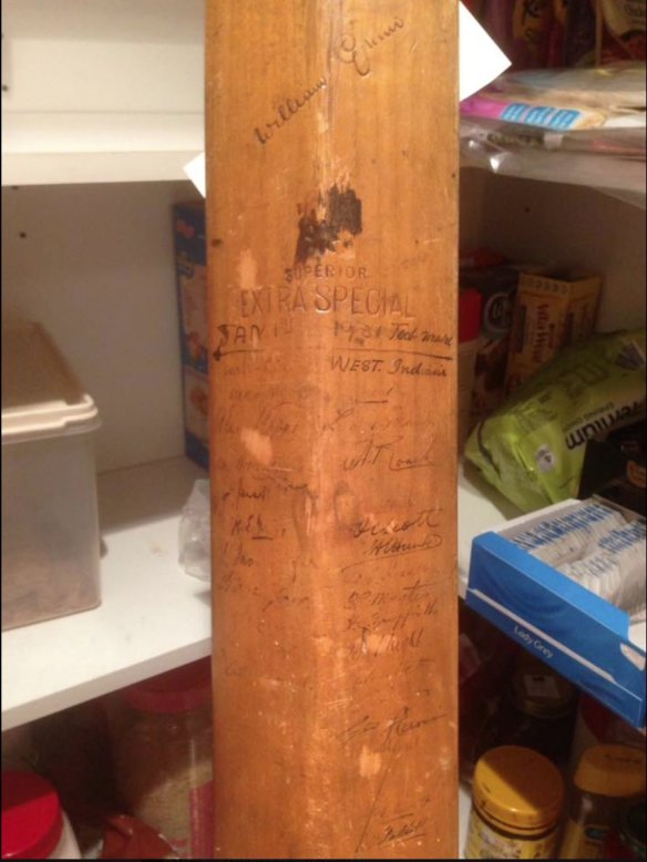 Signatures from 1931 West Indies test cricket team that toured Australia on spine of rare bat.