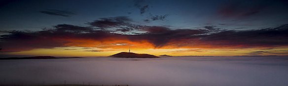 Canberra Morning Telstra Tower overlooks Canberra as it is shrouded in another thick fog