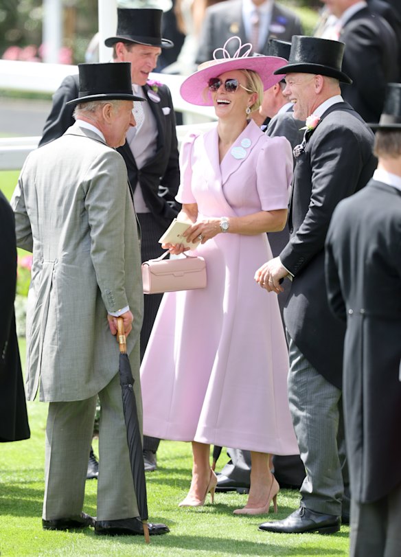 Zara Tindall and her husband Mike chat with her uncle King Charles at Royal Ascot.