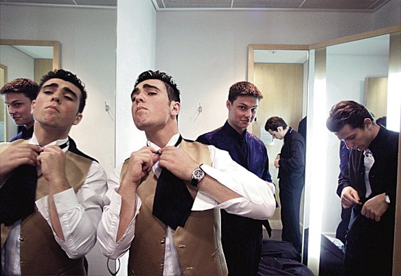 SPECIAL 10793 School Formals;151101;Sydney.  SMH News story by Julia Baird.  Photo by Peter Rae.  Photo shows, year 12 students, L  John Strada 17, Richie Philip 17,and Elias Bizannes17 Try on their formal wear at Grace Bros City store.