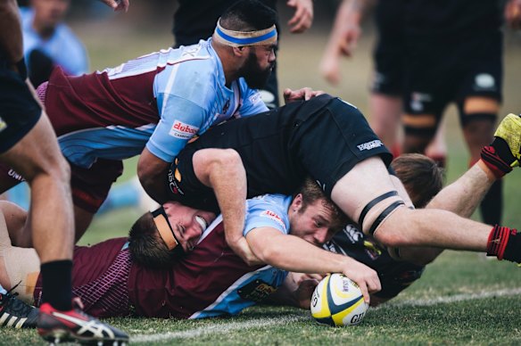 John I Dent Cup rugby union: Wests v Gungahlin. West's Harry Lloyd reaches to score a try.