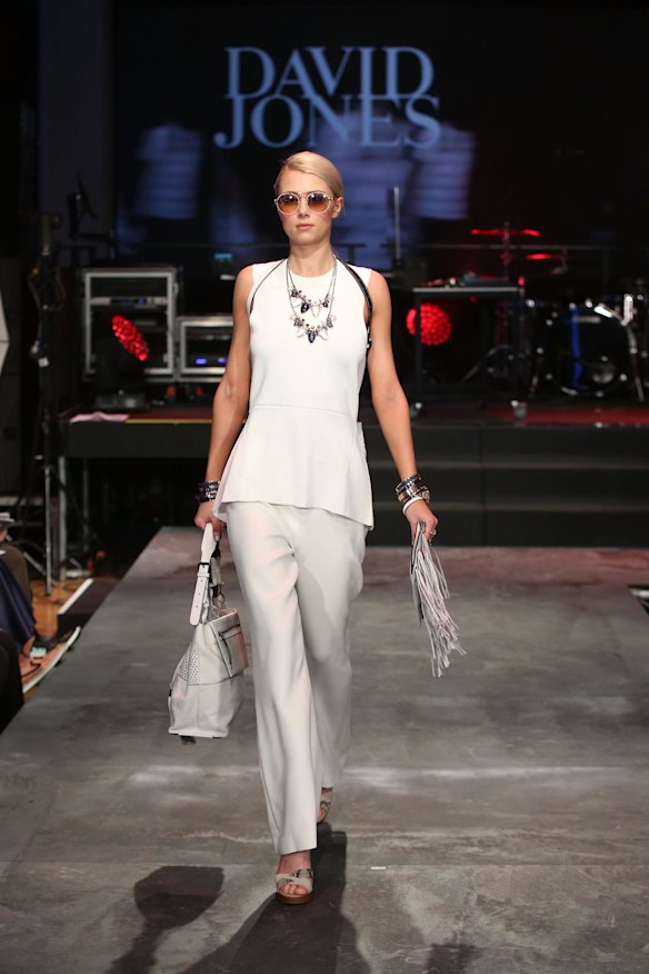 A model showcases designs by Mimco.