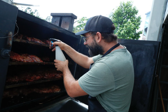 Jerry King of Jerry’s Smokehouse spent Good Friday barbecuing the leftover stock he had bought to sell at Bluesfest.