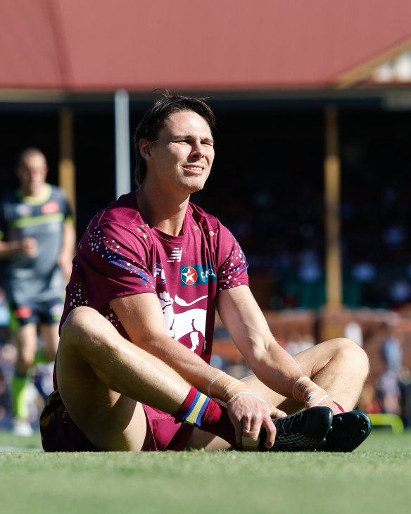 Lions forward Eric Hipwood stretches on Norwood Oval.