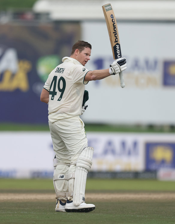 Smith salutes the crowd. 