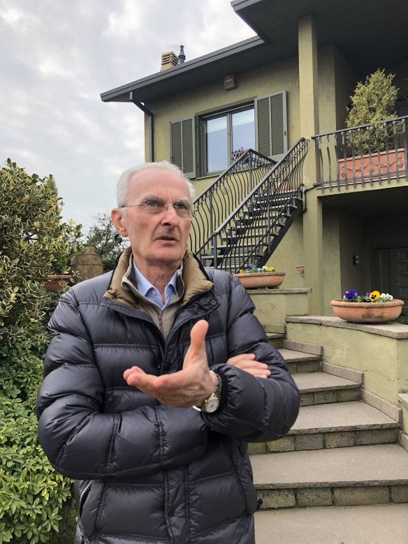 Luigi Malabarba outside his home on the edge of the quarantine zone in northern Italy. 