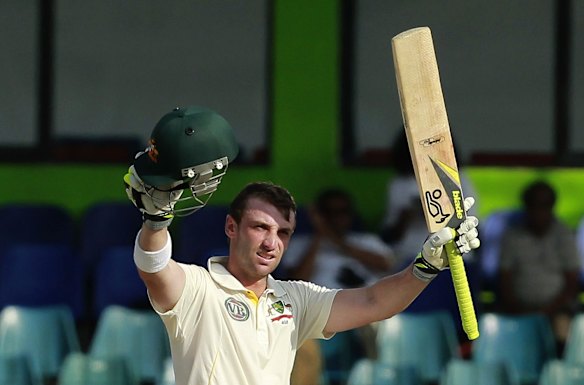 Phillip Hughes celebrates his third Test century against Sri Lanka in Colombo in 2011.