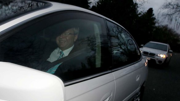 Prime Minister designate Kevin Rudd leaves his Canberra hotel in the front seat on Thursday 27 June 2013.