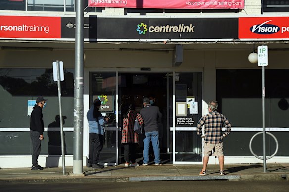 People queue outside Centrelink in Marrickville during the COVID-19 lockdown.