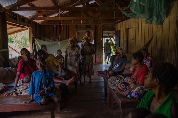 Patients at the Mougulu Medical Centre ward, Mougulu village.