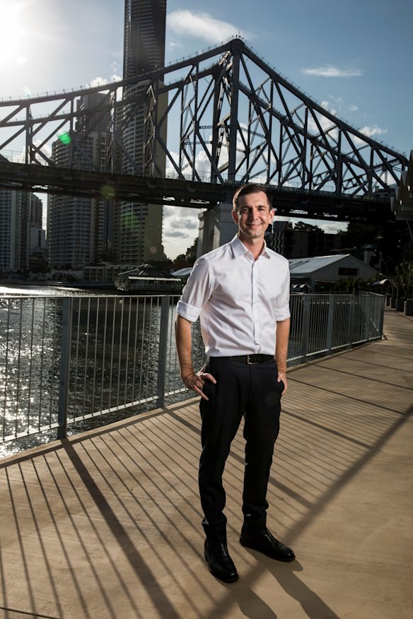 Liberal MP for Brisbane Trevor Evans near the Story Bridge.