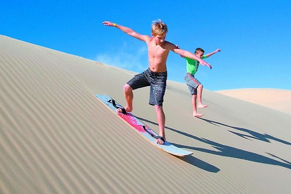 Sandboarding on the Stockton Dunes, Port Stephens. The experience: Sandboarding and four-wheel-driving in the dunes. Hire a car in Perth and head north, or book a stay at the Lancelin Lodge YHA and use its bus service from Perth. lancelinlodge. com.au, westernaustralia.com, stayz.com.au.