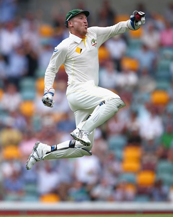 Brad Haddin celebrates taking a catch off Stuart Broad.