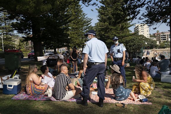 Police patrol picnics at Manly on the last weekend before COVID-19 restrictions are eased.