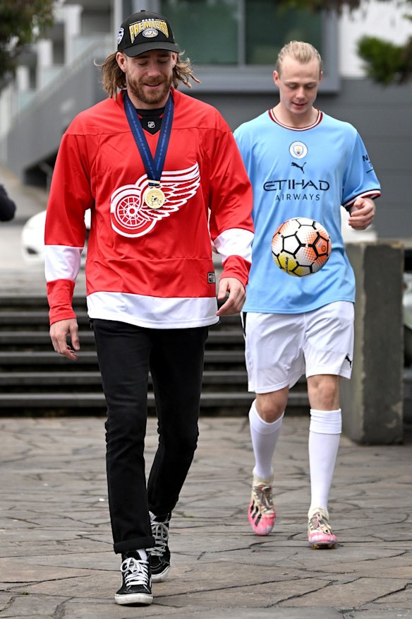 Cameron Guthrie (left) and Zach Guthrie arrive at Mad Monday