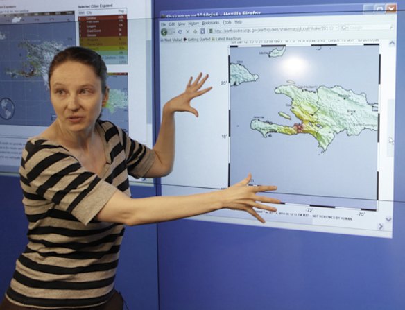 Dr. Paige Morgan, seismologist at the California Institute of Technology, shows a map of Haiti's earthquake epicentre.