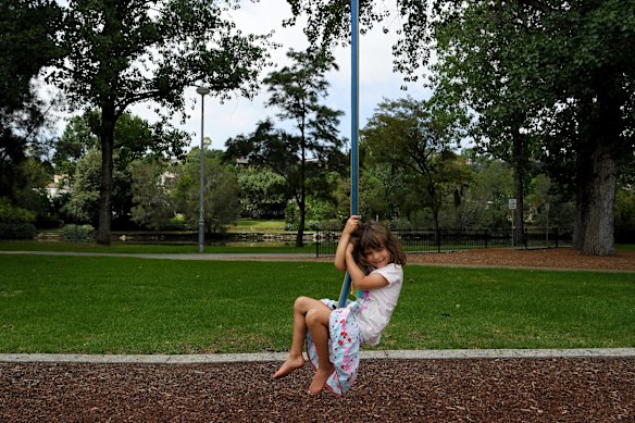 Ilsa Williams, 4, from Marrickville plays on a flying fox in Steel Park on the Cooks River in Marrickville, Sydney.