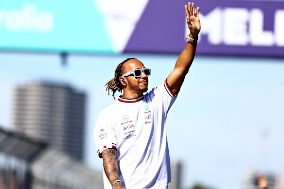  Lewis Hamilton of Great Britain and Mercedes waves to the crowd on the drivers parade.