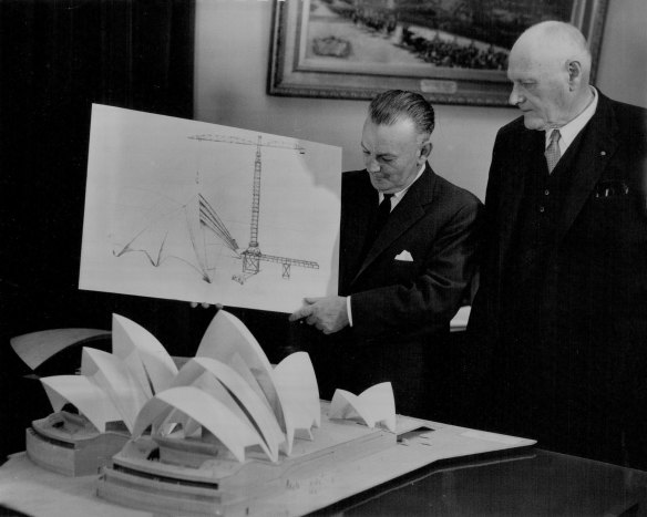 Here Mr. P. N. Ryan and Sir Manuel Hornibrook, Chairman and Managing Director of Hornibrook Ltd, discuss a sketch and model of the sails construction. October 19, 1962. 