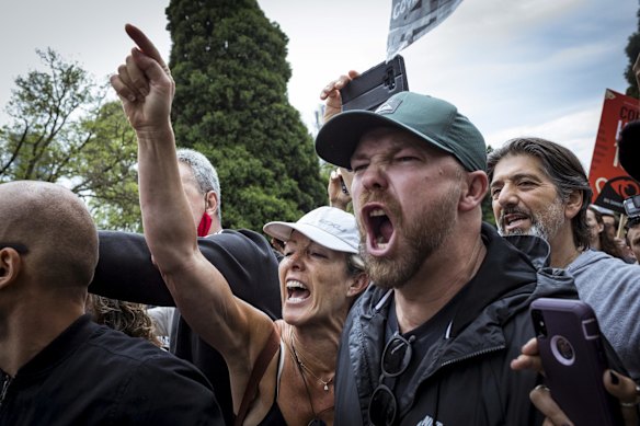 Police clash with protesters at the Shrine.