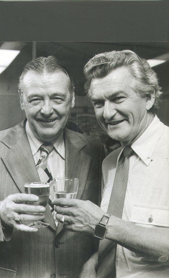 The new ACTU president Cliff Dolan having a drink with Bob Hawke, on the day he took over Hawke's old job.  