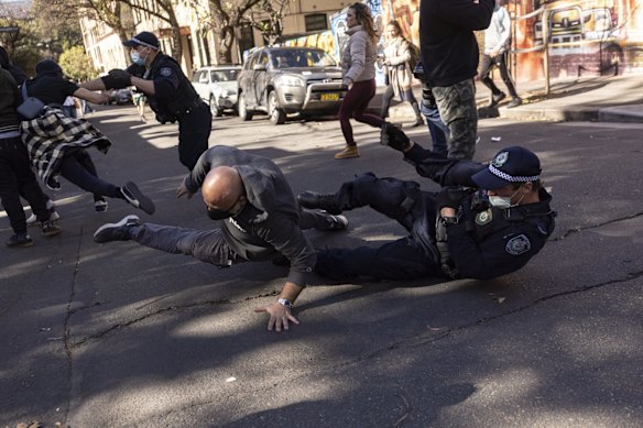Police clash with protestors in Chippendale.  With side roads blocked by mounted Police protestors made runs through Police lines in pitched violence through the suburb. 
