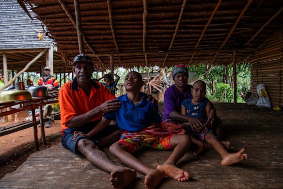 Fagabua Noah, Priscilla, Gobame Duma and Sally Joy. Both daughters have cerebral palsy. 