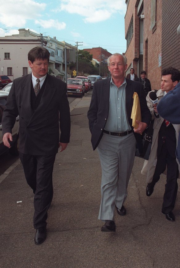 Roger Rogerson leaving the Glebe Coroners Court in 1996 where he was facing charges of murdering Christopher Dale Flannery and dumping his body at Cage Beach, Newcastle. 